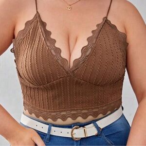 Brown cami lace top. It’s loose to me.